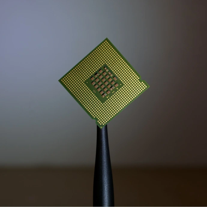 person holding computer cell processor